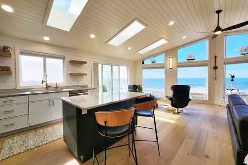 Kitchen island is the perfect perch to enjoy a cup of morning tea.