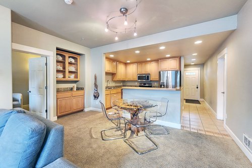 Dine in or play a favorite card game at the dining table.
