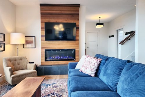 Wonderful spot to watch a movie and the flames in the fireplace.
