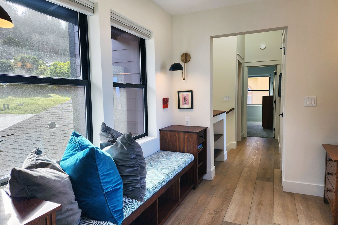 The hallway upstairs leads to either bedrooms or a fun game room!