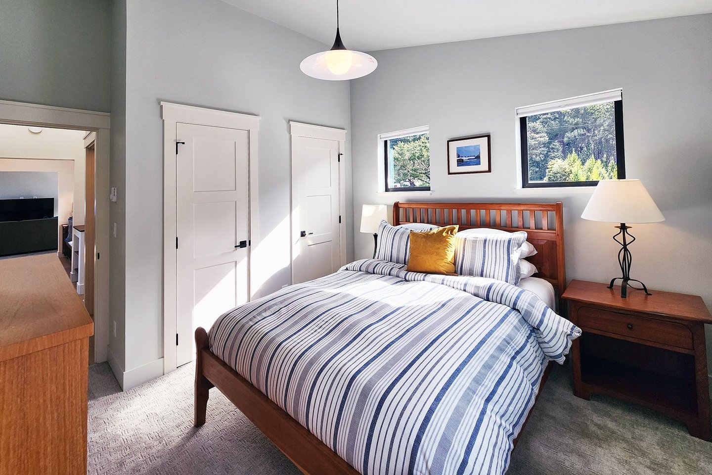 Upstairs bedroom with a comfy queen bed.