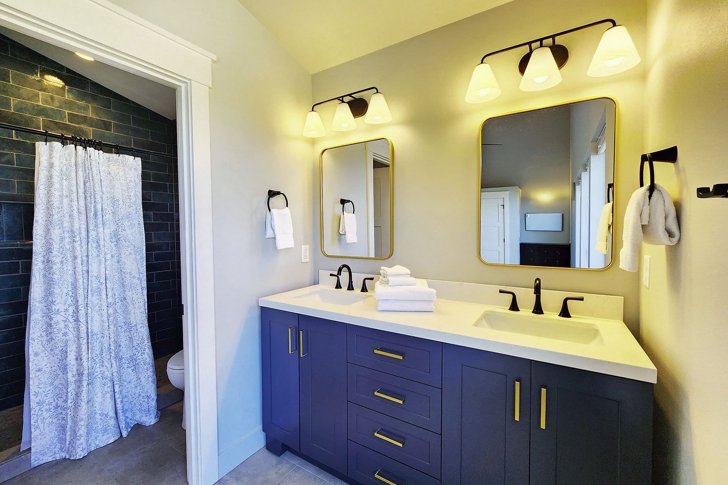Primary ensuite with a beautiful tiled walk in shower.