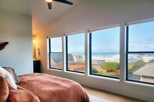 Lay in bed and enjoy the view of the ocean.
