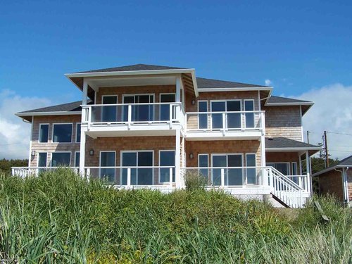 This amazing, beachfront, two story home.