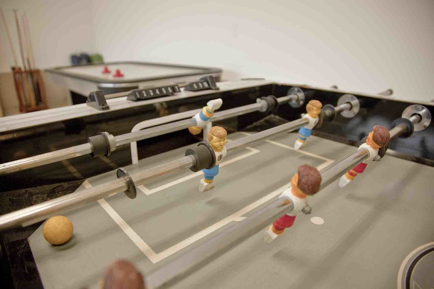A billiards/darts/air hockey room.