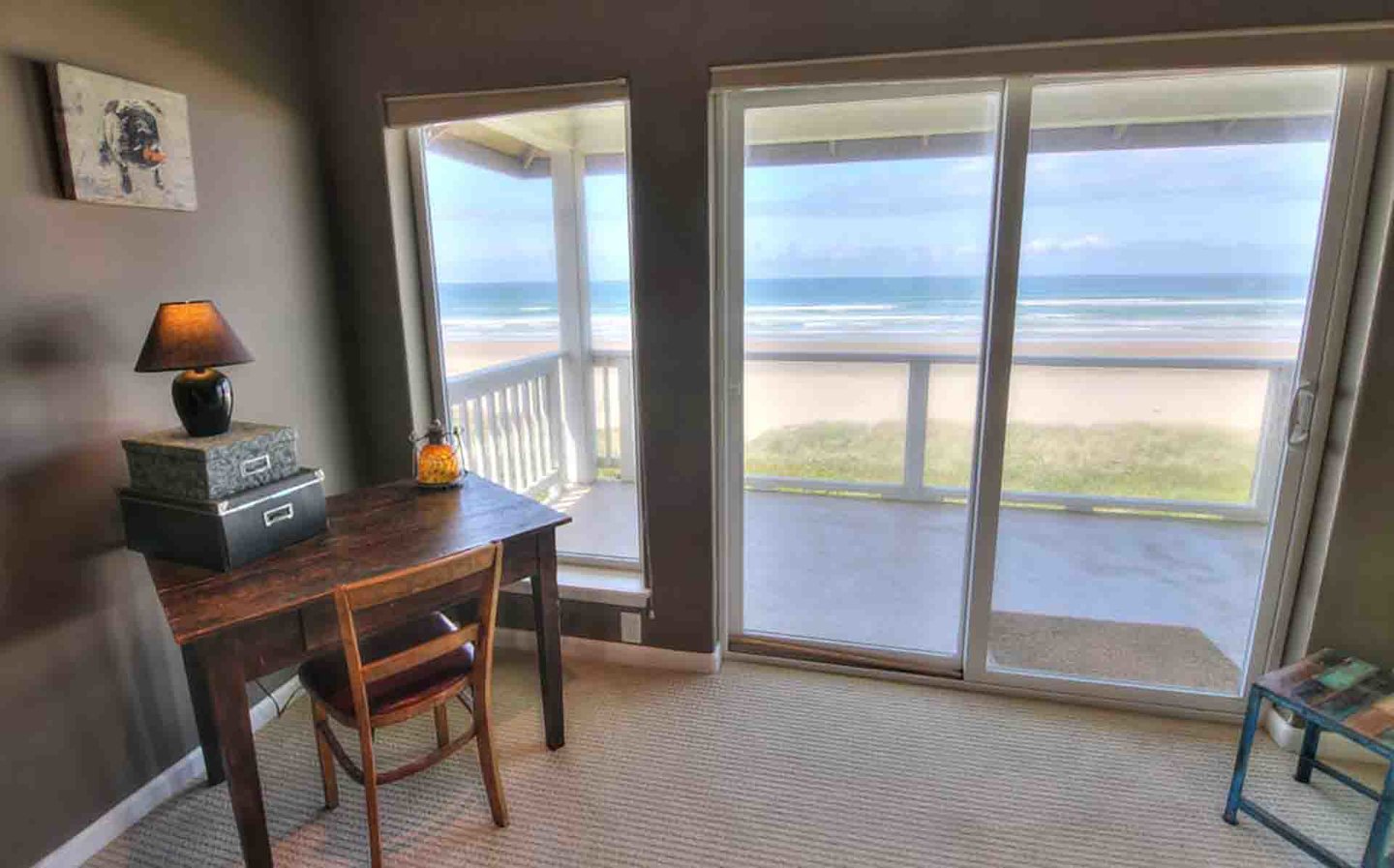 Enjoy the floor to ceiling windows and  a large ocean front deck.