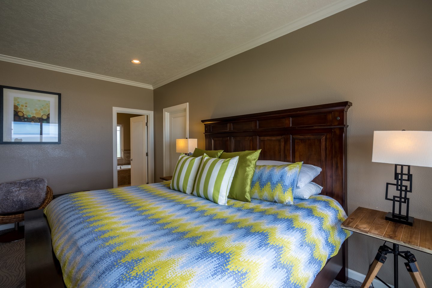 Beautiful classic furnishings in the ocean view ensuite bedroom.