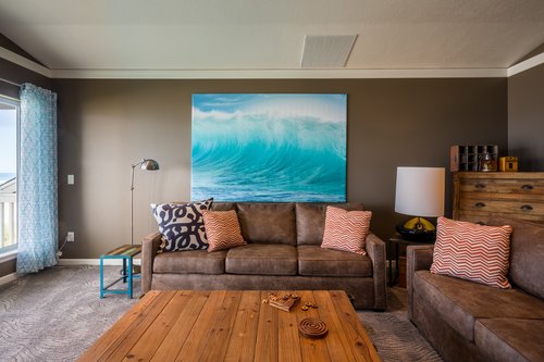 Enjoy the comfort of the upstairs den with plenty of seating for the family.