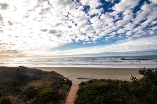 Oceanfront views from two floors and private beach access.