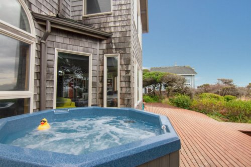 Relax in the ocean view private hot tub - a sea-side luxury.