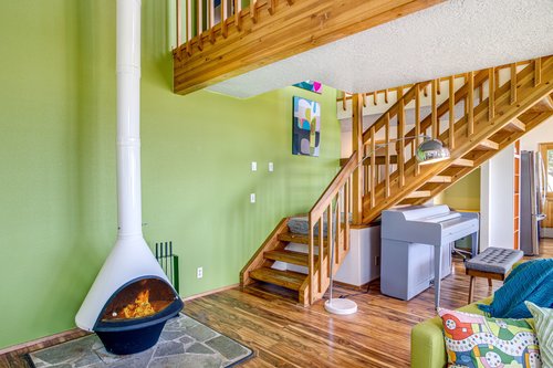 Relax by the unique fireplace in the living room.