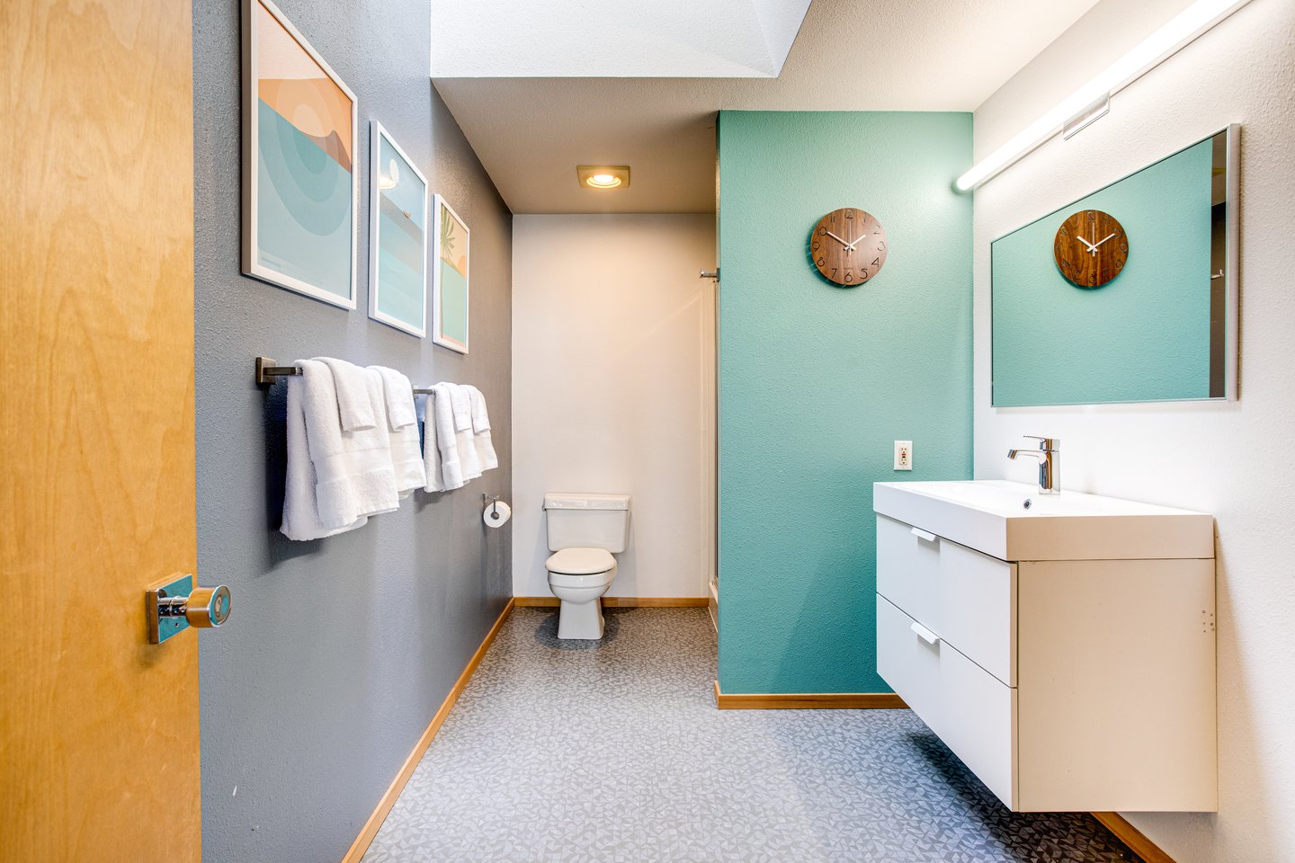 The bath upstairs is shared between the two bedrooms.