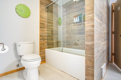 Refresh in the bright and colorful downstairs bathroom.