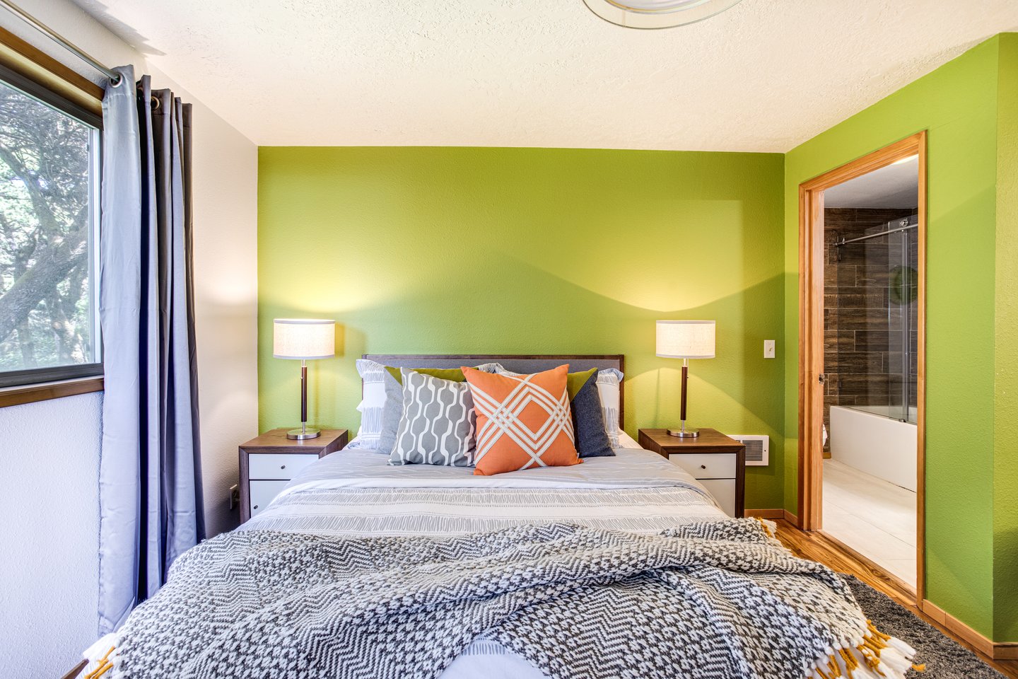 Cozy up in this inviting queen bed.