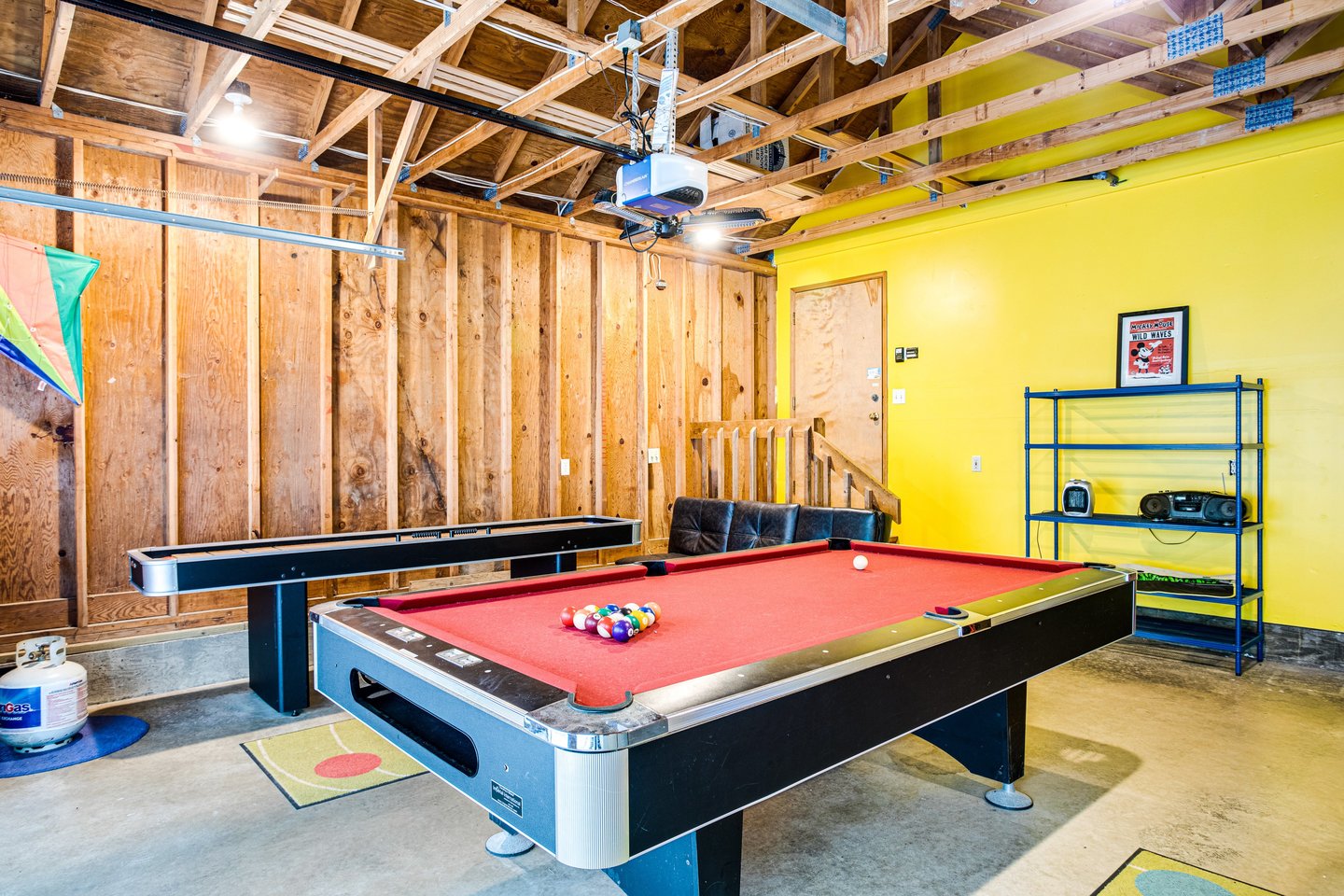 Fun for the whole family in the garage equipped with Foosball, ping pong, pool and shuffleboard.