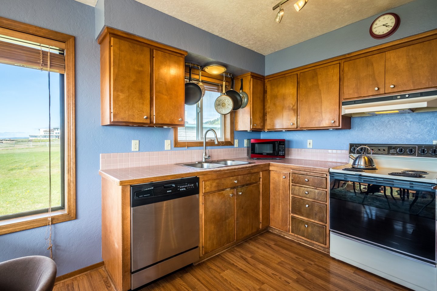Spacious, well equipped and colorful kitchen.