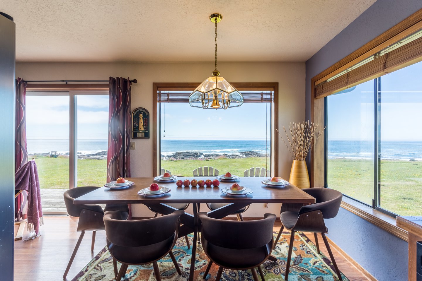 Watch the waves crash while dining in comfort