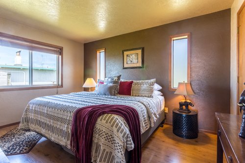 Comfortable primary bedroom suite with a private bath is a wonderful retreat.