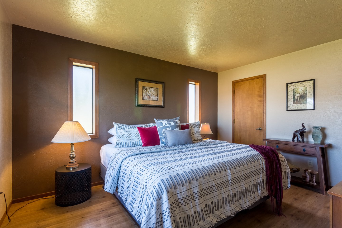 Relax in the king bed in the primary suite.
