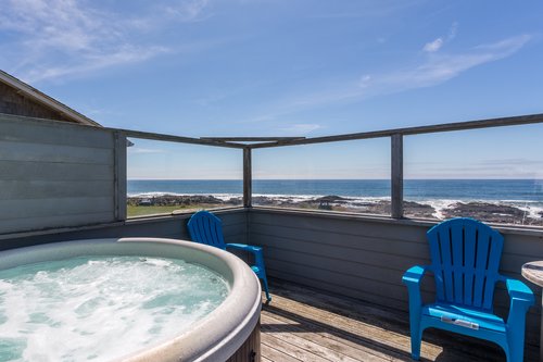 Relax and enjoy the incredible view from the private hot-tub!