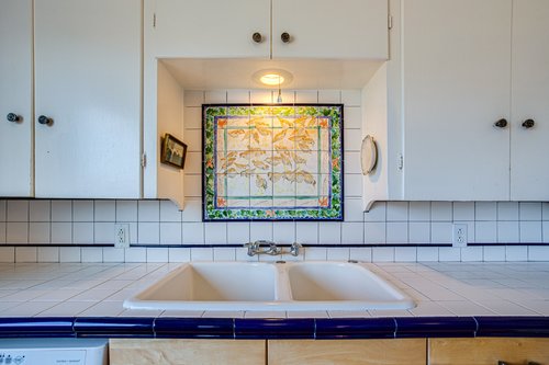 Quaint cabinetry and counters in the kitchen