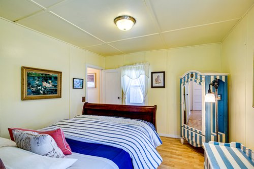 Relax in this bright room perfect for curling up with a book.