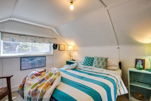 Cheery, comfortable furnishings bathe in light.