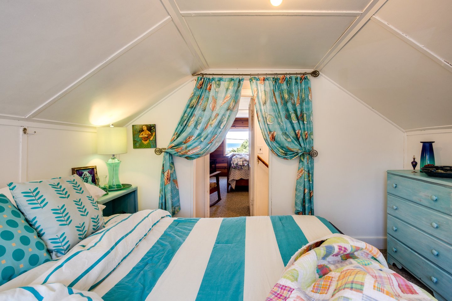 One of the two cozy upstairs bedrooms