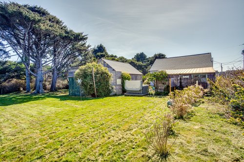 Large grassy backyard for outdoor fun