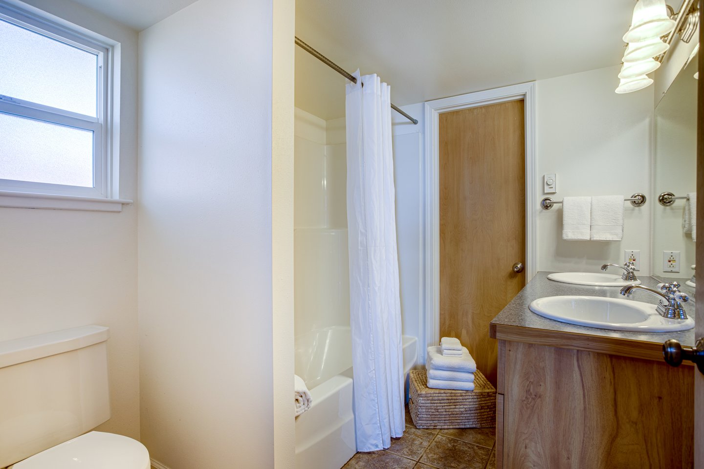 Bathroom features a double vanity sink.