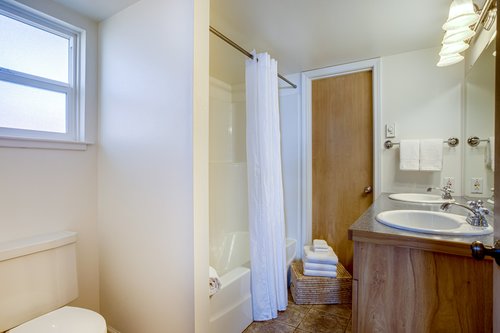 Bathroom features a double vanity sink.