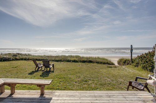 The sunny deck is the perfect place to relax- the path you see does not lead to beach access!