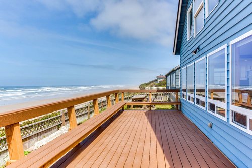 The ocean front deck and a wall of windows make this the perfect spot to vacation!