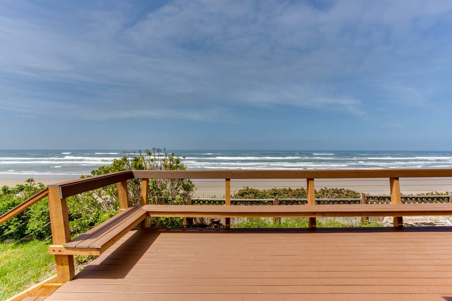 Large deck with bench seating is a great place to gather.