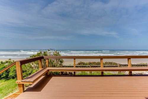 Large deck with bench seating is a great place to gather.