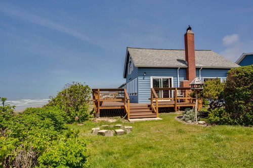 Large yard adjoins the home.