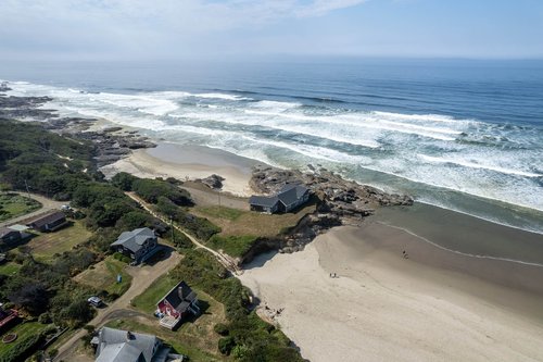 Walk for miles to the north on sandy beaches.
