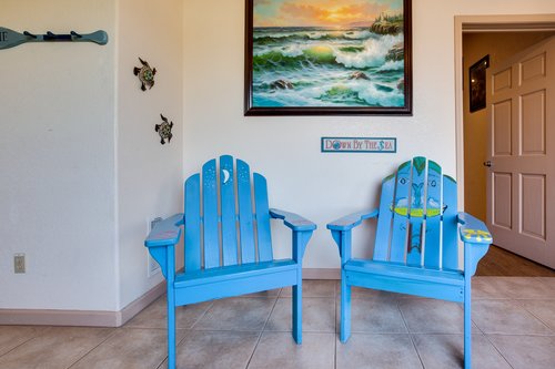 The Ocean Blue chairs greet you in the large entryway.
