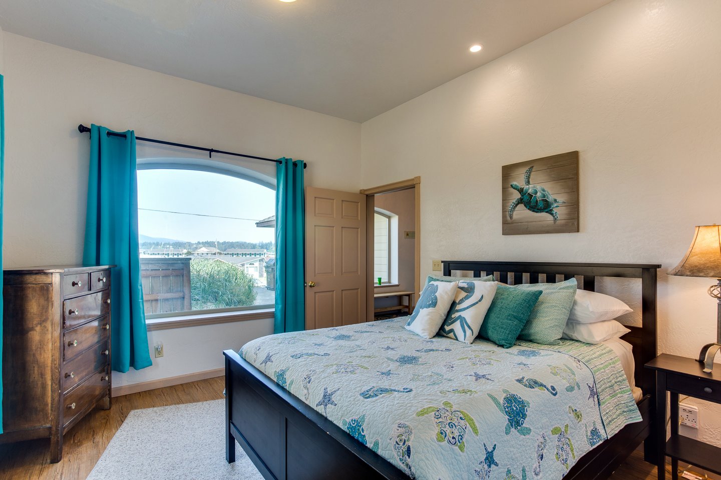 Large downstairs bedroom with queen bed.