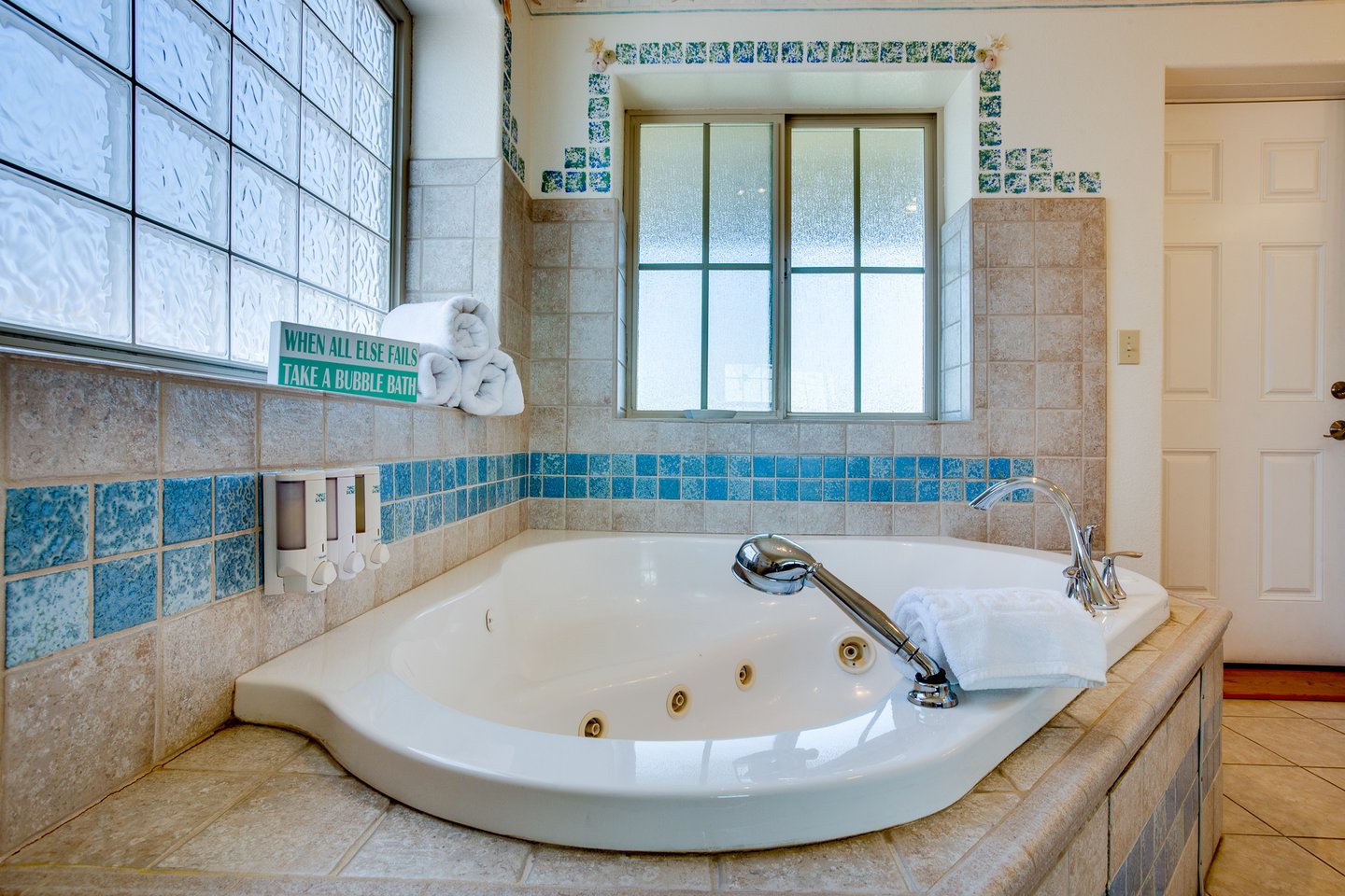 Relax in the jacuzzi tub in the primary bath ensuite.