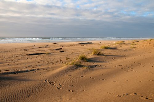 Go barefoot and enjoy the soft sandy beach for miles.