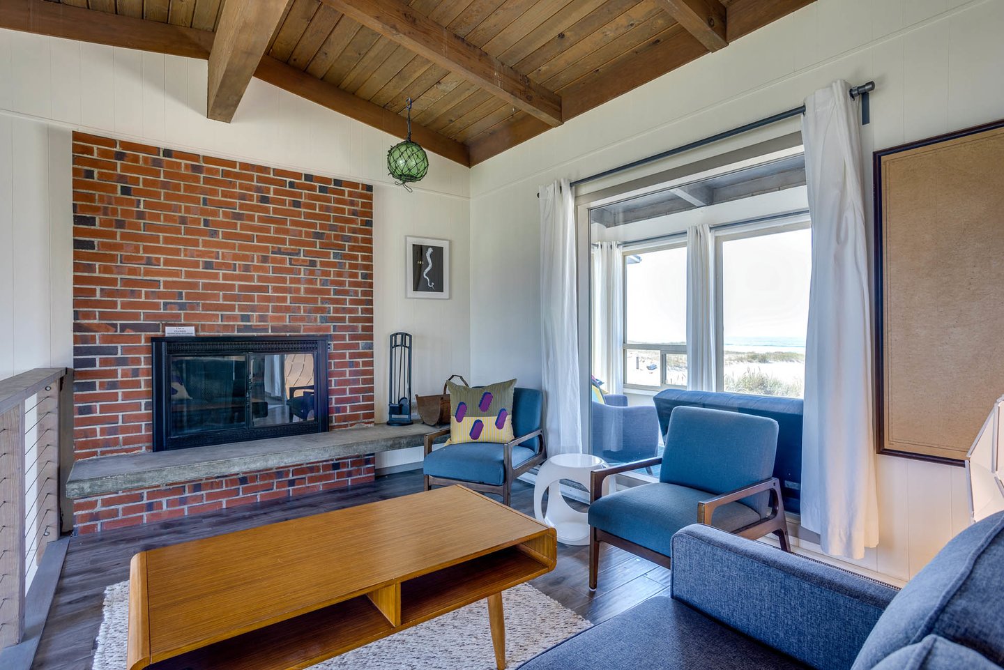 Comfortable seating in the second floor living area with bay and ocean views