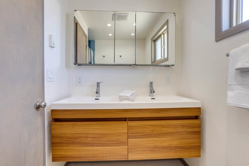 Modern bath with double sinks.