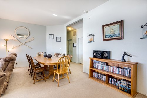 The dining room has plenty of seating for everyone with two dining tables.