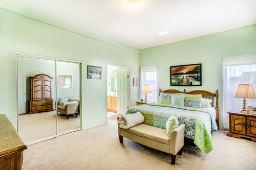 Large master bedroom has plenty of space.