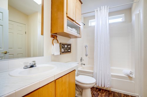 The shared bathroom in the hall has a tub/shower combo.