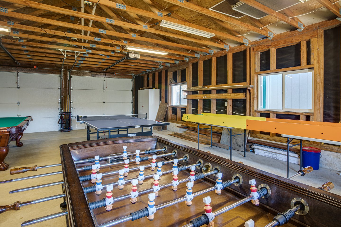 The garage is converted into a game room to enjoy.