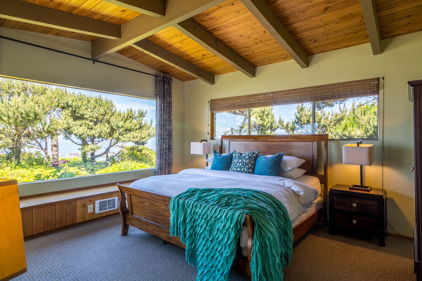 The primary bedroom, watch the endless waves crash into the gorgeous rock outcroppings.