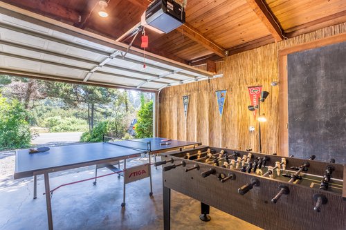 Get competitive in the garage game room with foosball and ping pong.