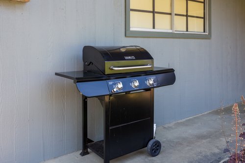 Gas grill is waiting to help you with dinner.